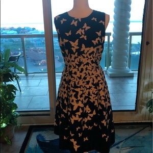 Lovely butterflies scattered on this.